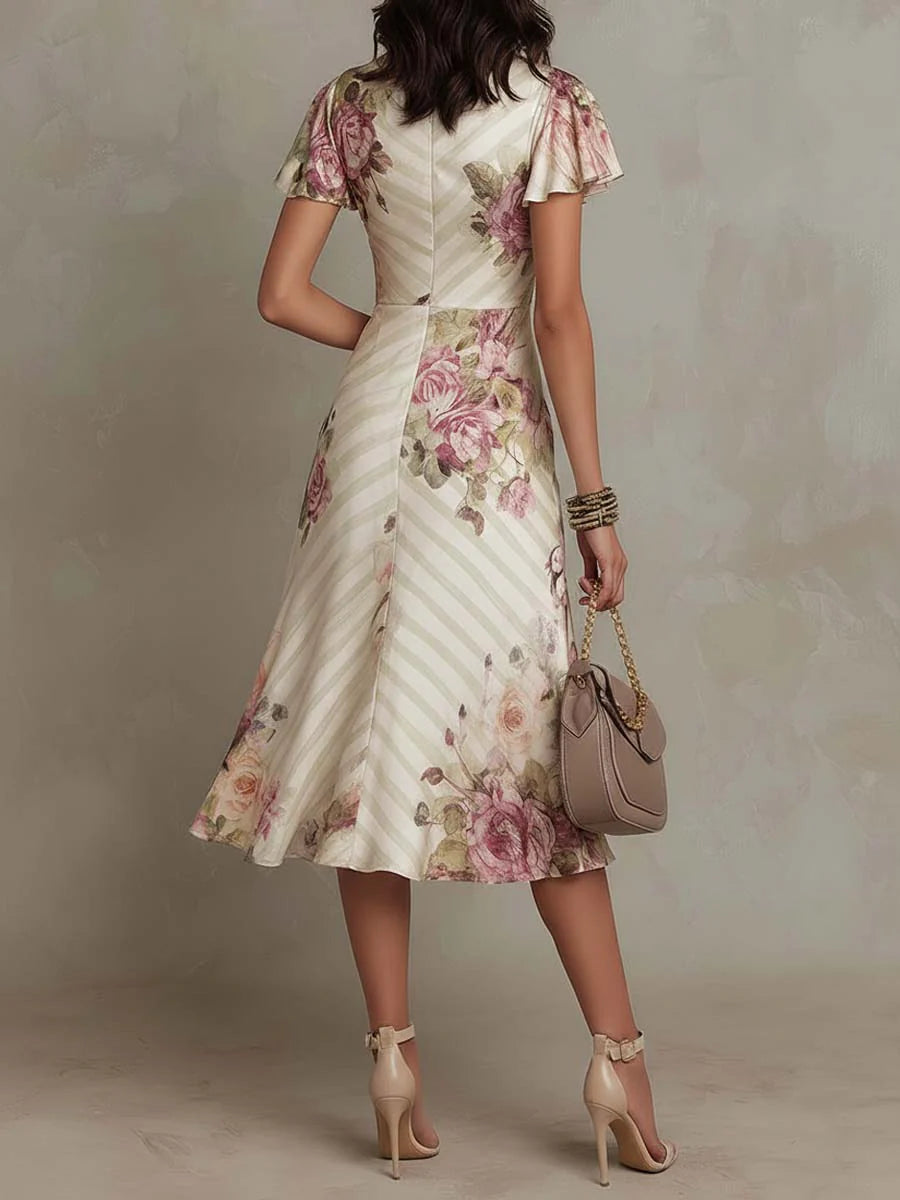 Alba - Elegancka midi sukienka w retro stylu z satynowym kwiatowym motywem