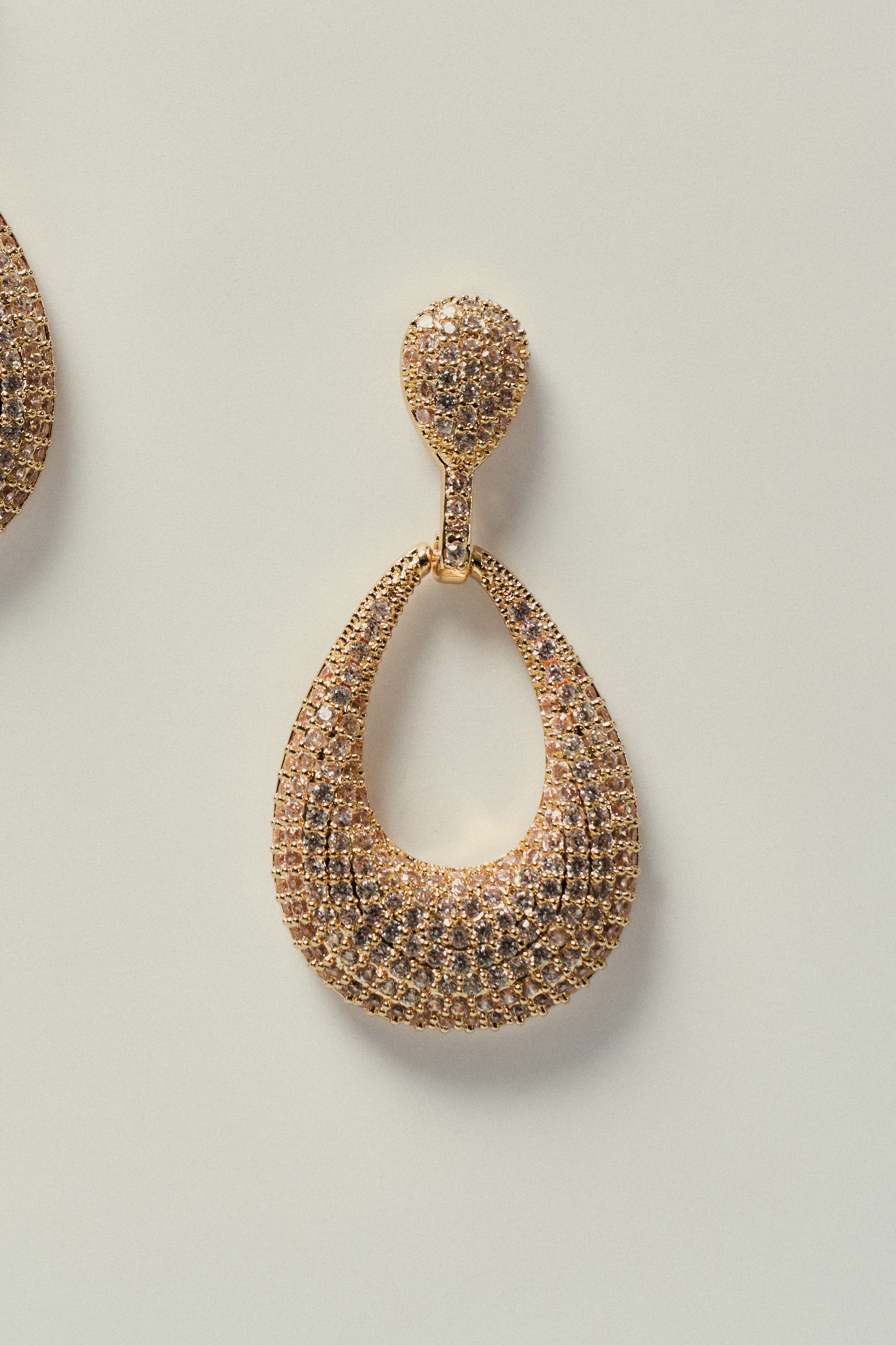 Oval Hollow Earring with Gold Strass Inlay